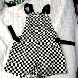 Checkered overalls.